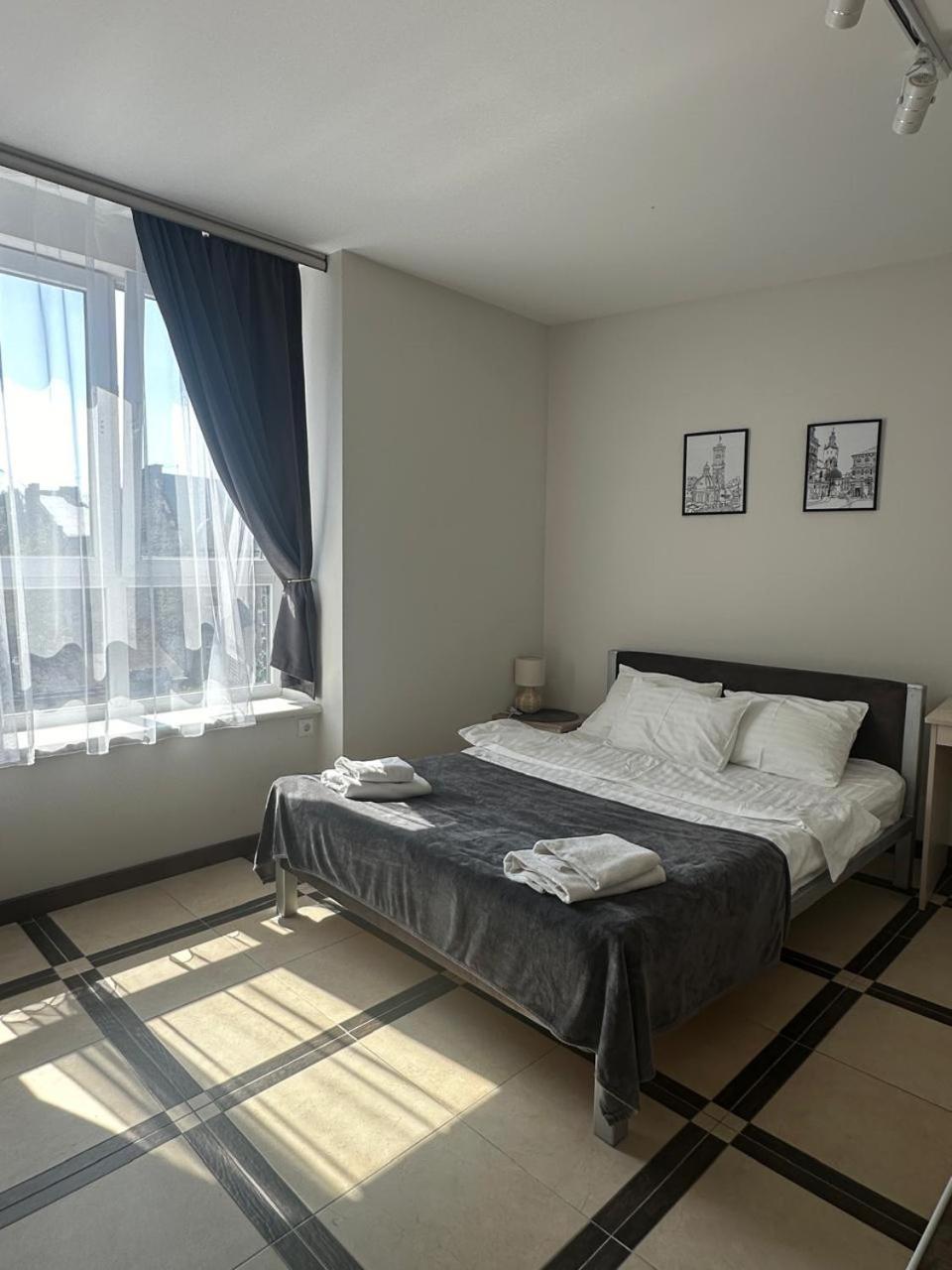 Opera Center Hotel & Apartments リヴィウ エクステリア 写真